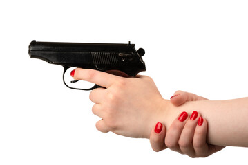 Young woman with a manicure holds a Makarov pistol aimed at some target.