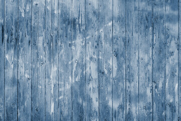 Fototapeta na wymiar blue toned old distressed wooden plank wall background