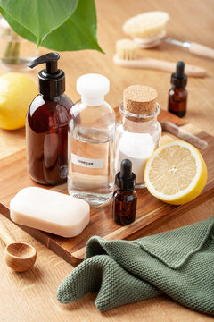 zero waste eco friendly cleaning concept. wooden brushes, baking soda, vinegar
