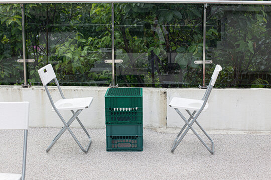 Plastic Milk Crate Table With Chair In Cafe