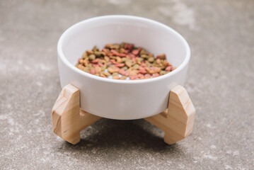Wooden custom display for pet food bowl. Handmade cat dining table.