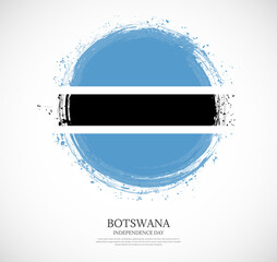 Creative circular grungy shape brush stroke flag of Botswana on a solid background