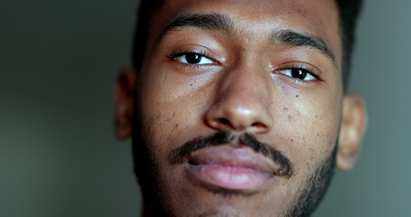 Obraz premium Friendly African american male portrait face close-up