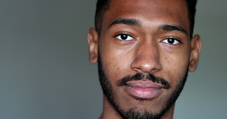 Obraz premium Friendly African american male portrait face close-up