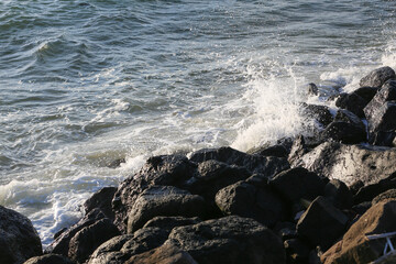 waves crashing on rocks