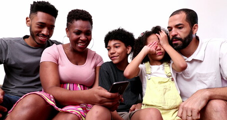 Obraz premium Family using phone at home couch, tired sleepy daughter