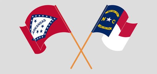 Crossed flags of The State of Arkansas and The State of North Carolina. Official colors. Correct proportion