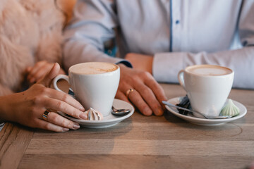 person with cup of coffee