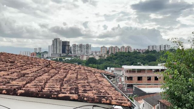 City in Colombia. Buildings and architecture Colombia. Residential apartment building. House roof. Urban. Sunny day.