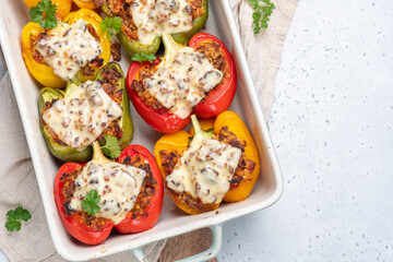 Colorful peppers stuffed with meat, bulgur and cheese