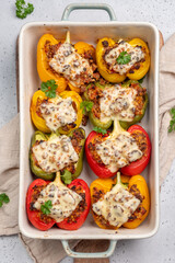 Colorful peppers stuffed with meat, bulgur and cheese