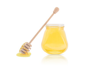 Isolate a jar of honey with a stick for honey