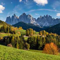 Autumn evening Santa Magdalena famous Italy Dolomites village surroundings view in front of the Geisler or Odle Dolomites mountain rocks.