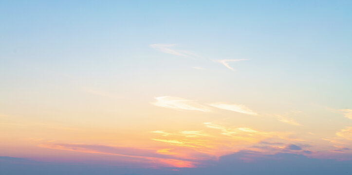Beautiful tiny clouds in the twilight on sky. Atmosphere bacground. Beige, pastel pink and pearl