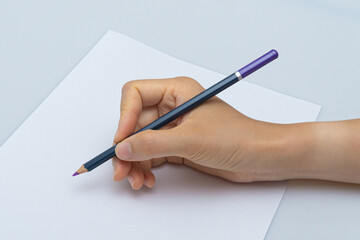 Various colored pencils on a white background