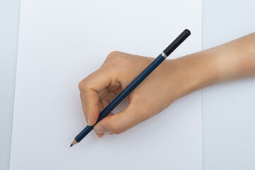 Various colored pencils on a white background