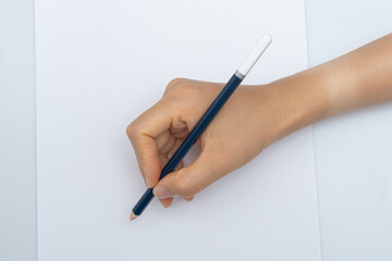 Various colored pencils on a white background