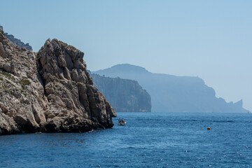 Fototapeta premium Limestone cliffs near Cassis, boat excursion to Calanques national park in Provence, France