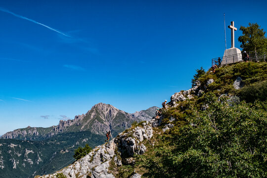 Trekking scene in Valsassina with Grigna mountain in background