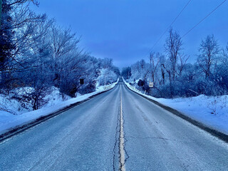 Obraz premium Wintertime snow landscape and icy trees