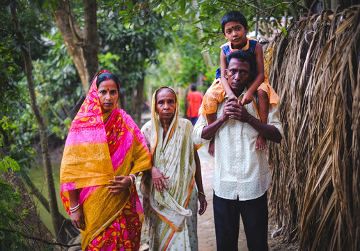 South Asian Family Picture . Happy Bangladeshi Hindu Family In A Village Outdoor Environment. 