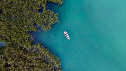 aerial view of boat in the reeds