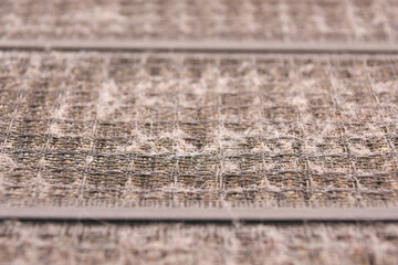 Air filter clogged with a dust,close up macro and selective focus