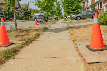 Repairs on the road marked with soft red conesRemont buj