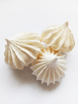 sweet delicious meringue dessert on white background