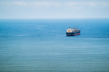 Industrial ship in blue sea