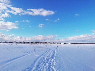 Fototapeta na wymiar Tourism. Journey. Winter. Lots of white snow.
