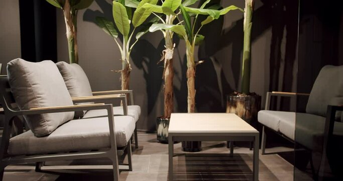 Modern Chairs for luxury villa, Summer Terrace furniture with minimalist chair and table. Furniture for garden, Modern Luxury Villa. Minimalist apartment. Outdoor table and chairs for garden park.