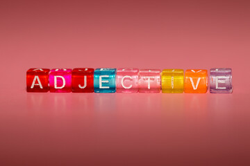 the word "adjective" made up of cubes