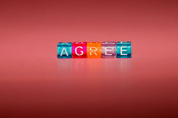 the word "agree" made up of cubes