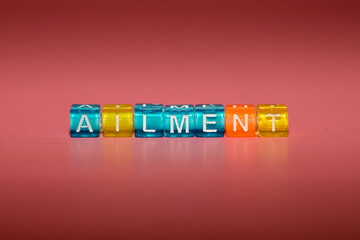 the word "ailment" made up of cubes