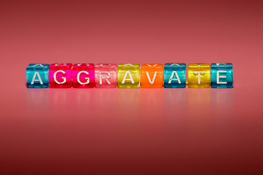 the word "aggravate" made up of cubes