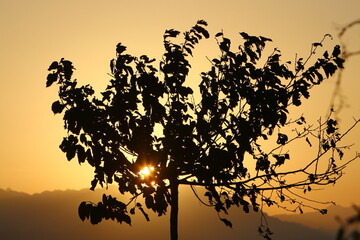 Sunrise at the Dead Sea in Israel. The sun comes out from behind the mountains in Jordan.