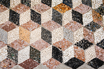 Decorative pebble mosaic. Floor mosaic of colored stones.