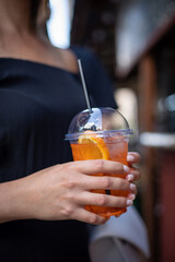 Fototapeta premium woman with cocktail in cafe