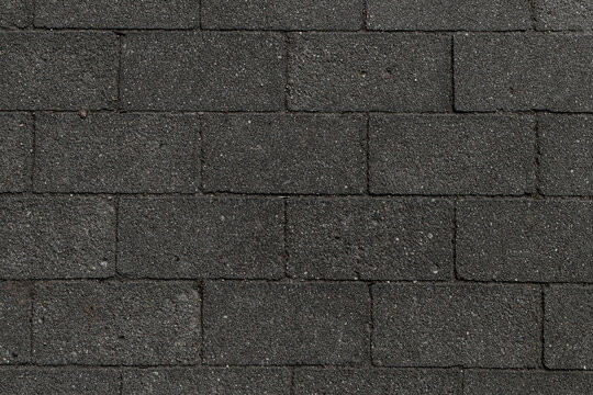 Top view on paving slabs. Gray paving slabs for pedestrian street