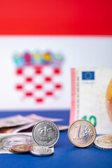 Croatian currency, kuna, together with Euro coins and 10 Euro banknote. Croatia adopted a European currency theme with the Croatian flag motif in the background. - obrazy, fototapety, plakaty