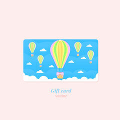 Gift card with balloons with basket and clouds on a blue background