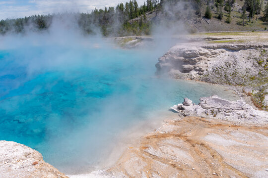 The bright blue pool of Excelsior Geyser at the Midway Geyser Basin in Yellowstone National Park. © MariannePfeil