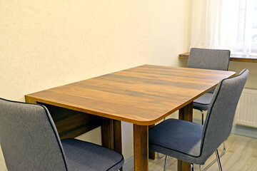 Dining table and upholstered chairs in the kitchen