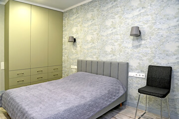 Double bed and wardrobe in a modern bedroom