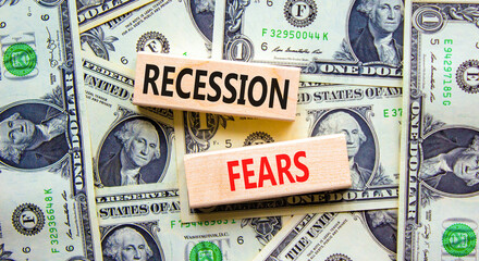 Recession fears symbol. Concept words Recession fears on wooden blocks on a beautiful background...