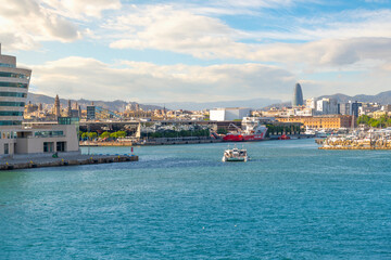 Fototapeta premium View from the Mediterranean Sea of the Port of Barcelona and city skyline including the Torre Glòries skyscraper.