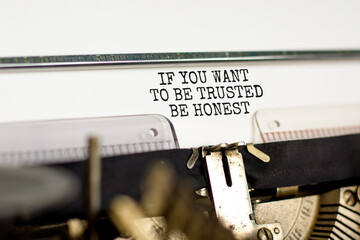 Be trusted and honest symbol. Concept words If you want to be trusted be honest typed on old retro typewriter. Beautiful white background. Business and be trusted and honest concept. Copy space. - obrazy, fototapety, plakaty