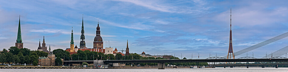 Fototapeta premium Panoramic image depicting historical district of Riga - the capital city of Latvia, it offers for tourists many resting opportunities and unique medieval and Gothic architecture