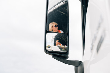 Middle age truck driver woman, trucker occupation in Europe for females